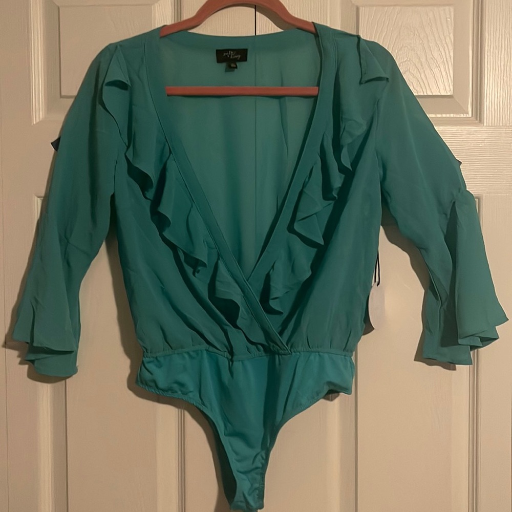 Women’s teal ruffled short/bodysuit